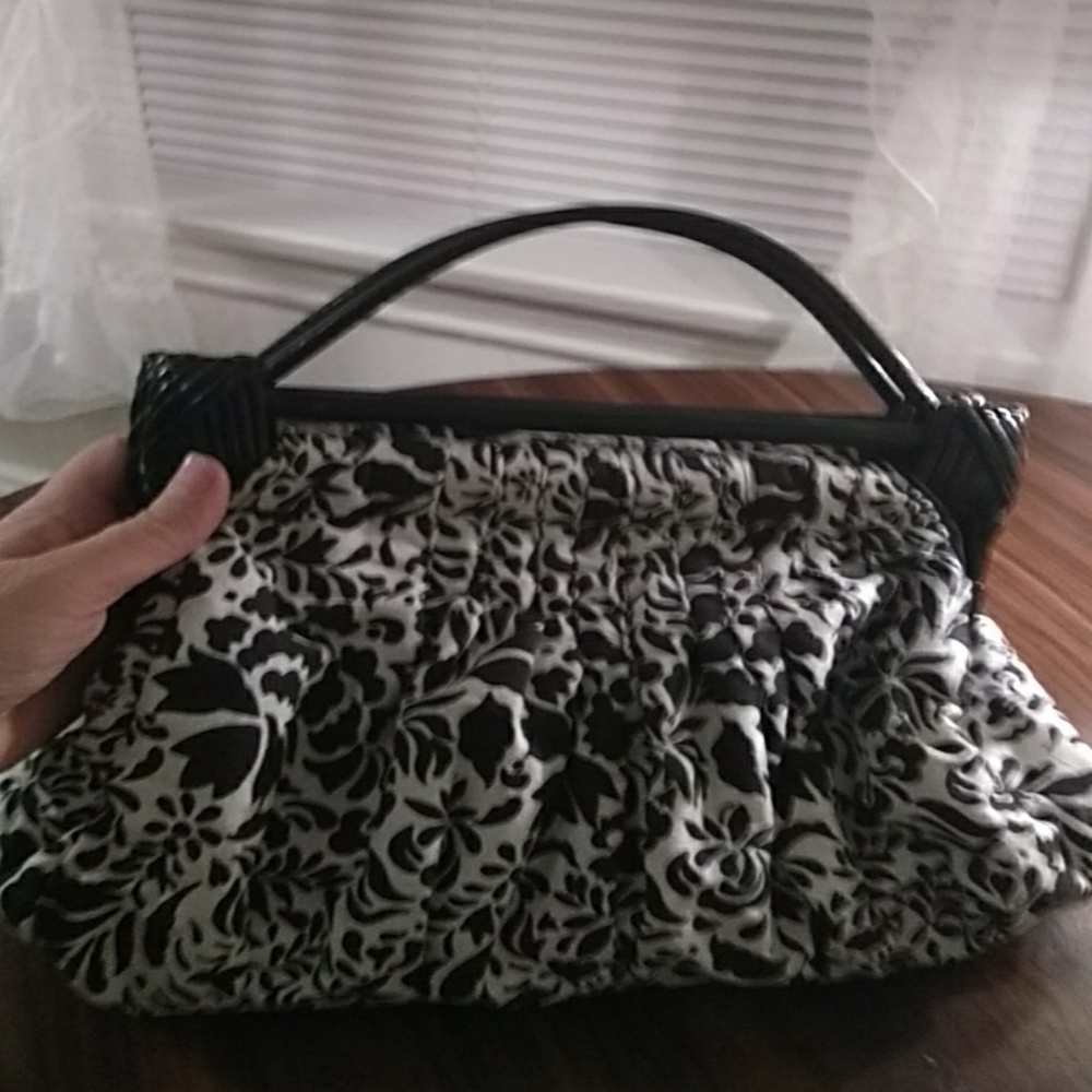 Black and white floral cotton purse.
